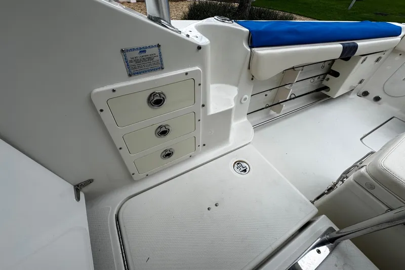  Yacht Photos Pics 2007 Hydra-Sports Vector 3300 VX boat interior with storage compartments and seating.