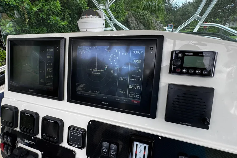  Yacht Photos Pics Dashboard of a 2007 Hydra-Sports Vector 3300 VX with Garmin navigation displays.