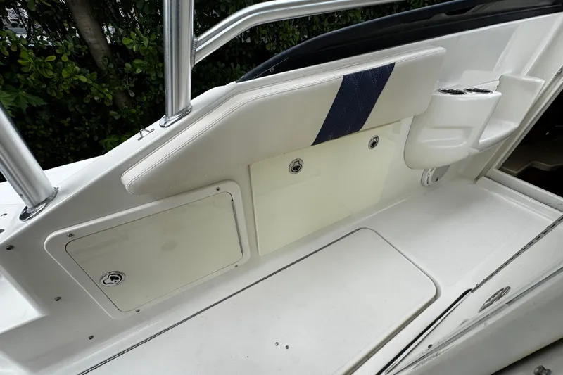  Yacht Photos Pics 2007 Hydra-Sports Vector 3300 VX boat interior with storage compartments and cup holders.