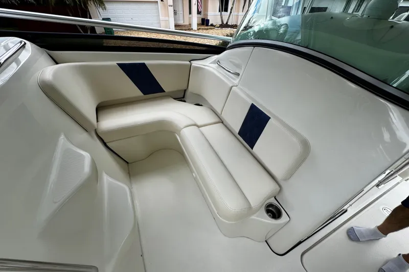  Yacht Photos Pics 2007 Hydra-Sports Vector 3300 VX boat interior with white cushioned seating.