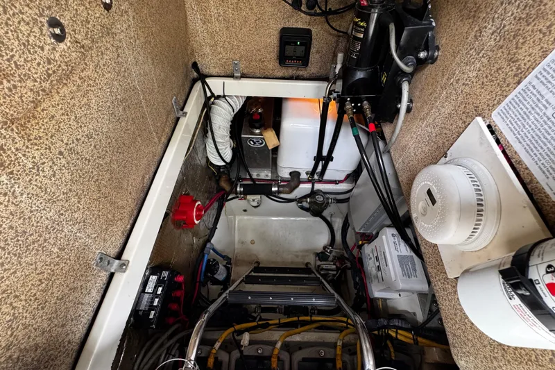  Yacht Photos Pics Engine compartment of a 2007 Hydra-Sports Vector 3300 VX boat, showing various mechanical components.