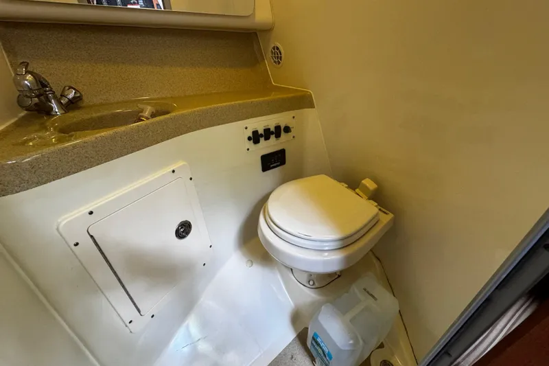  Yacht Photos Pics 2007 Hydra-Sports Vector 3300 VX boat bathroom with sink and toilet.