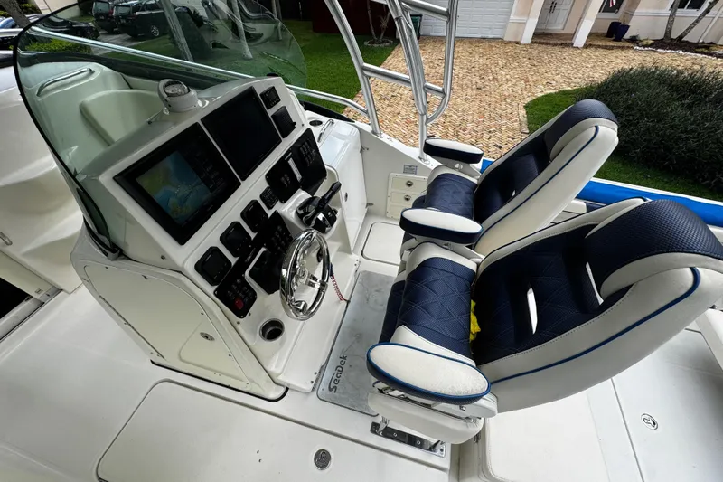  Yacht Photos Pics 2007 Hydra-Sports Vector 3300 VX boat cockpit with dual seats and navigation controls.