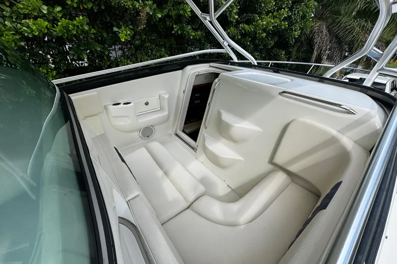  Yacht Photos Pics 2007 Hydra-Sports Vector 3300 VX boat interior with white seating and storage compartments.