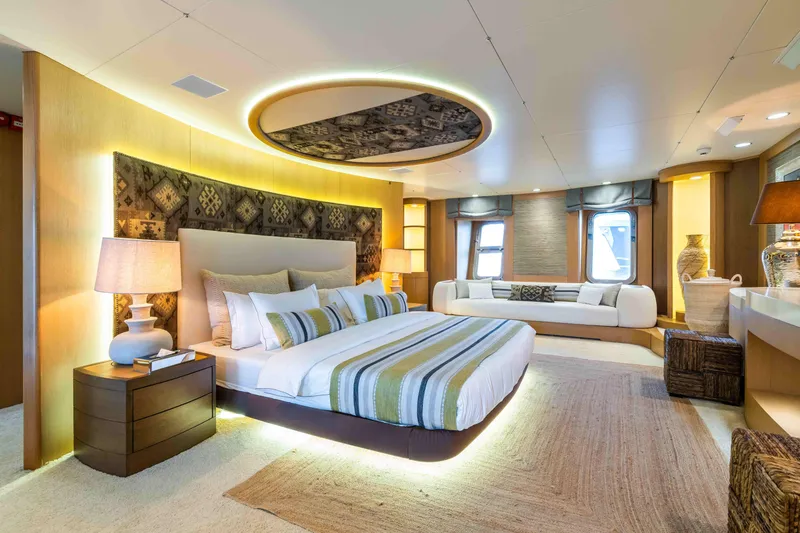 Yazz Yacht Photos Pics Luxurious 2007 Aegean Yacht bedroom with elegant decor, ambient lighting, and modern furnishings.