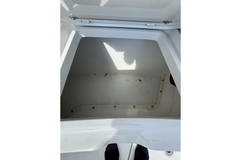  Yacht Photos Pics Open storage compartment on 2018 Yellowfin 32 Offshore boat, showing interior space.