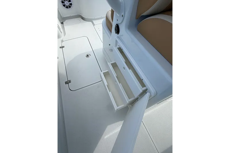  Yacht Photos Pics 2018 Yellowfin 32 Offshore boat interior with open storage compartments.