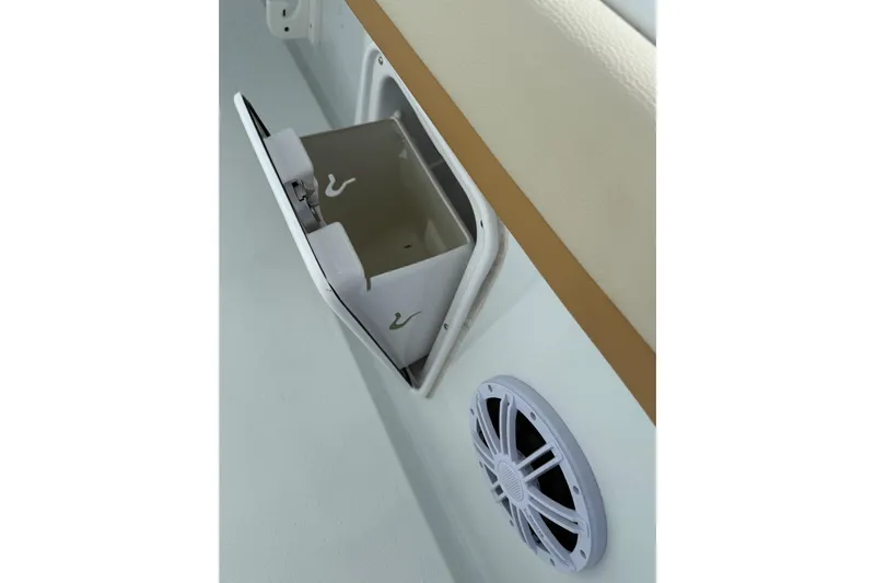  Yacht Photos Pics 2018 Yellowfin 32 Offshore boat storage compartment and speaker detail.