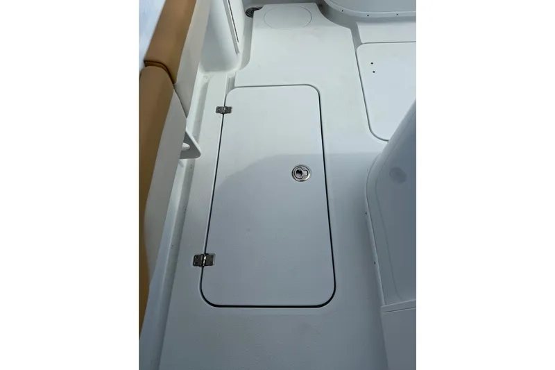  Yacht Photos Pics 2018 Yellowfin 32 Offshore boat deck with storage compartment.