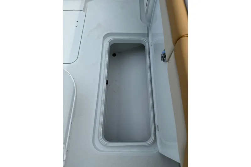  Yacht Photos Pics Open storage compartment on 2018 Yellowfin 32 Offshore boat deck.
