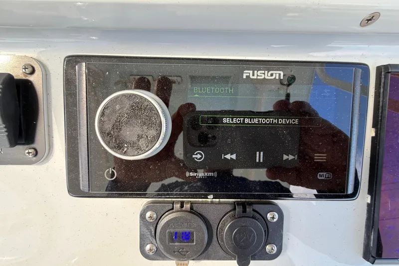  Yacht Photos Pics Fusion Bluetooth stereo system on 2018 Yellowfin 32 Offshore boat dashboard.