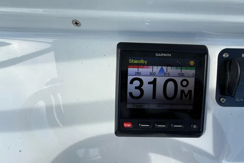  Yacht Photos Pics Garmin navigation display on 2018 Yellowfin 32 Offshore boat showing 310-degree heading.
