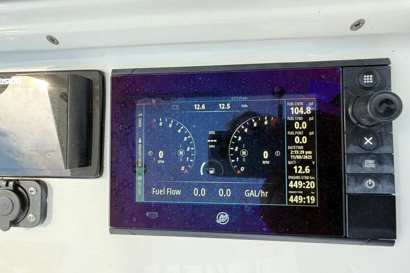  Yacht Photos Pics Dashboard of a 2018 Yellowfin 32 Offshore boat showing fuel and engine data.