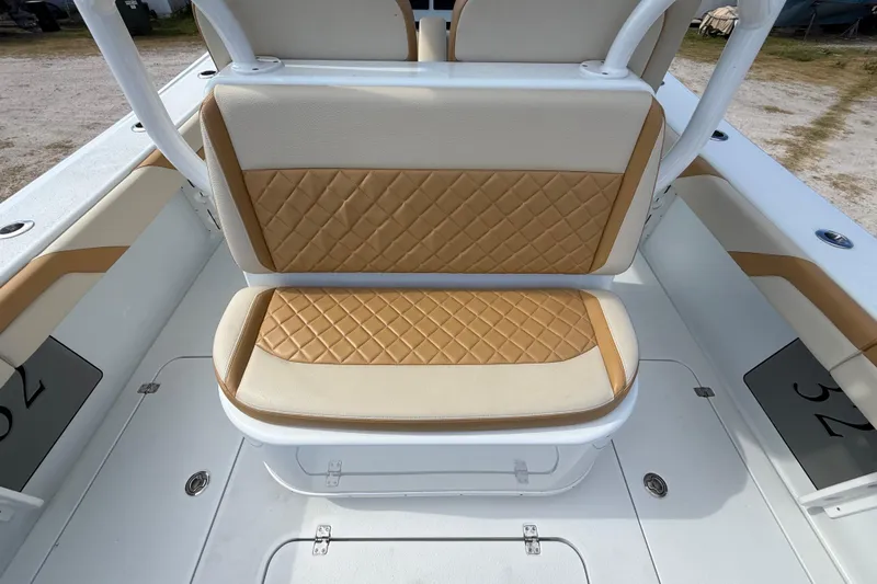  Yacht Photos Pics 2018 Yellowfin 32 Offshore boat with tan and white quilted seating.