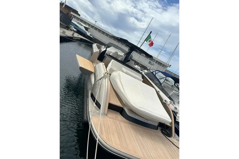  Yacht Photos Pics 2024 Solaris Power 44 yacht docked, showcasing sleek design and luxurious deck features.