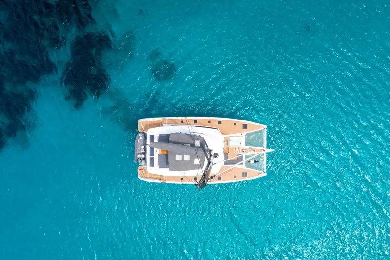 Semper Fidelis Yacht Photos Pics Aerial view of Fountaine Pajot Alegria 67 sailing multihull