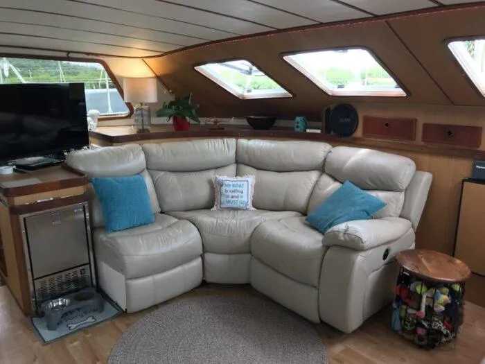 Vitesse Yacht Photos Pics Luxurious interior of 1989 Lagoon 55 yacht with leather sofa and modern decor.