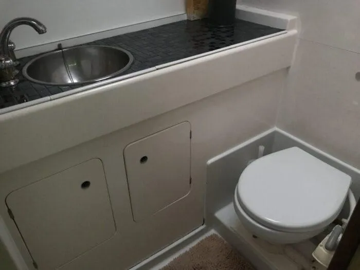 Vitesse Yacht Photos Pics 1989 Lagoon 55 yacht bathroom with sink and toilet