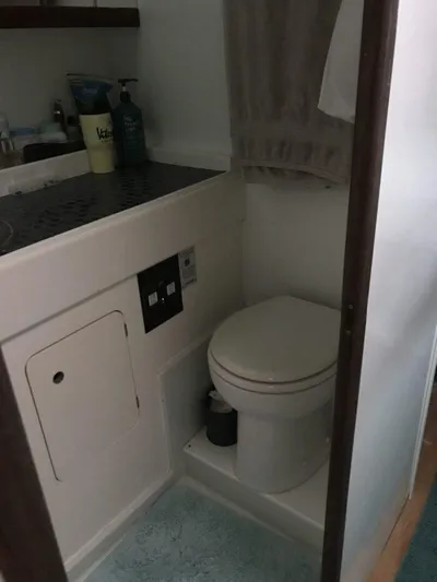 Vitesse Yacht Photos Pics Bathroom in 1989 Lagoon 55 yacht with toilet and sink.