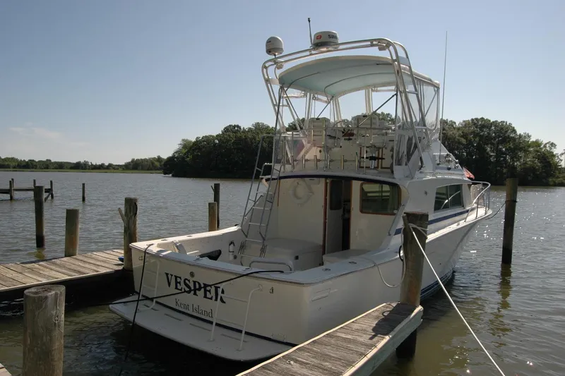 Vesper Yacht Photos Pics 1987 Bertram 33 Sport Fisherman docked at Kent Island marina.