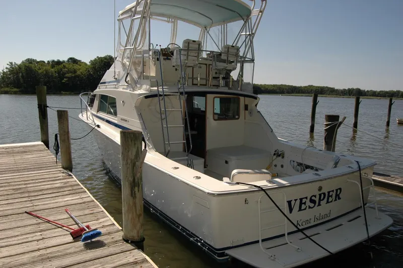 Vesper Yacht Photos Pics 1987 Bertram 33 Sport Fisherman docked at Kent Island marina.