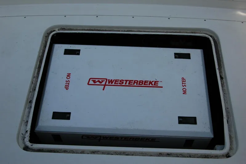 Vesper Yacht Photos Pics Westerbeke generator compartment on 1987 Bertram 33 Sport Fisherman boat.