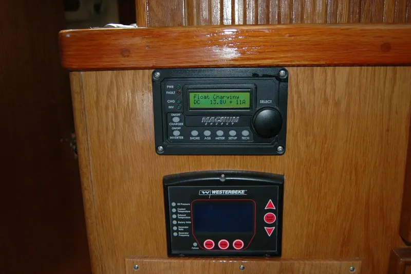 Vesper Yacht Photos Pics Control panels on a 1987 Bertram 33 Sport Fisherman boat interior.