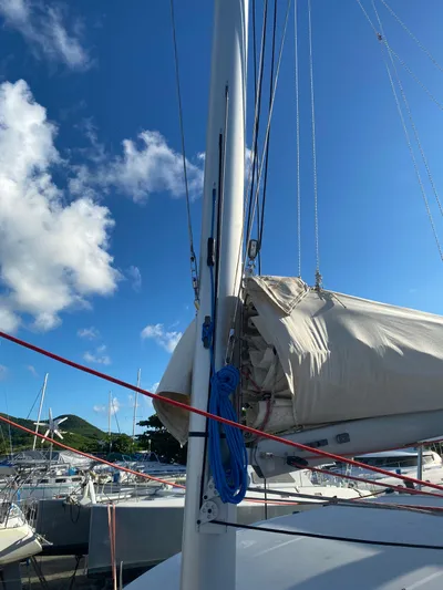 Eugenite Yacht Photos Pics 2013 Lagoon 380 sailboat mast and rigging against a clear blue sky.