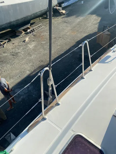 Eugenite Yacht Photos Pics Lagoon 380 catamaran deck view, 2013 model, in a boatyard setting.