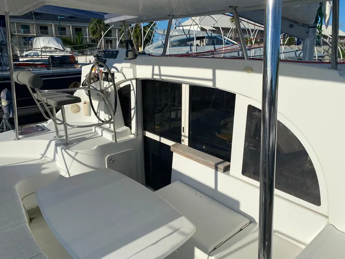 Eugenite Yacht Photos Pics Lagoon 380 catamaran cockpit, 2013 model, featuring helm station and seating area.