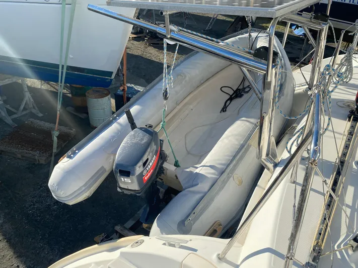 Eugenite Yacht Photos Pics Inflatable boat with outboard motor on Lagoon 380 catamaran, 2013 model.