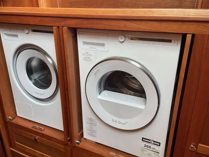 Last Resort Yacht Photos Pics Laundry appliances in a 2021 Sabre 58 Salon Express yacht interior.