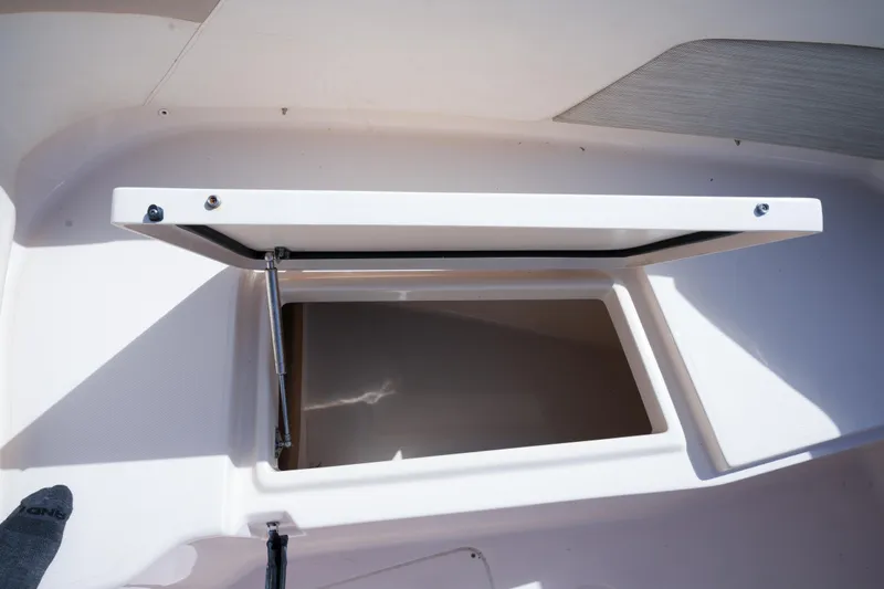  Yacht Photos Pics Open storage compartment on 2014 Grady-White Freedom 307 boat.