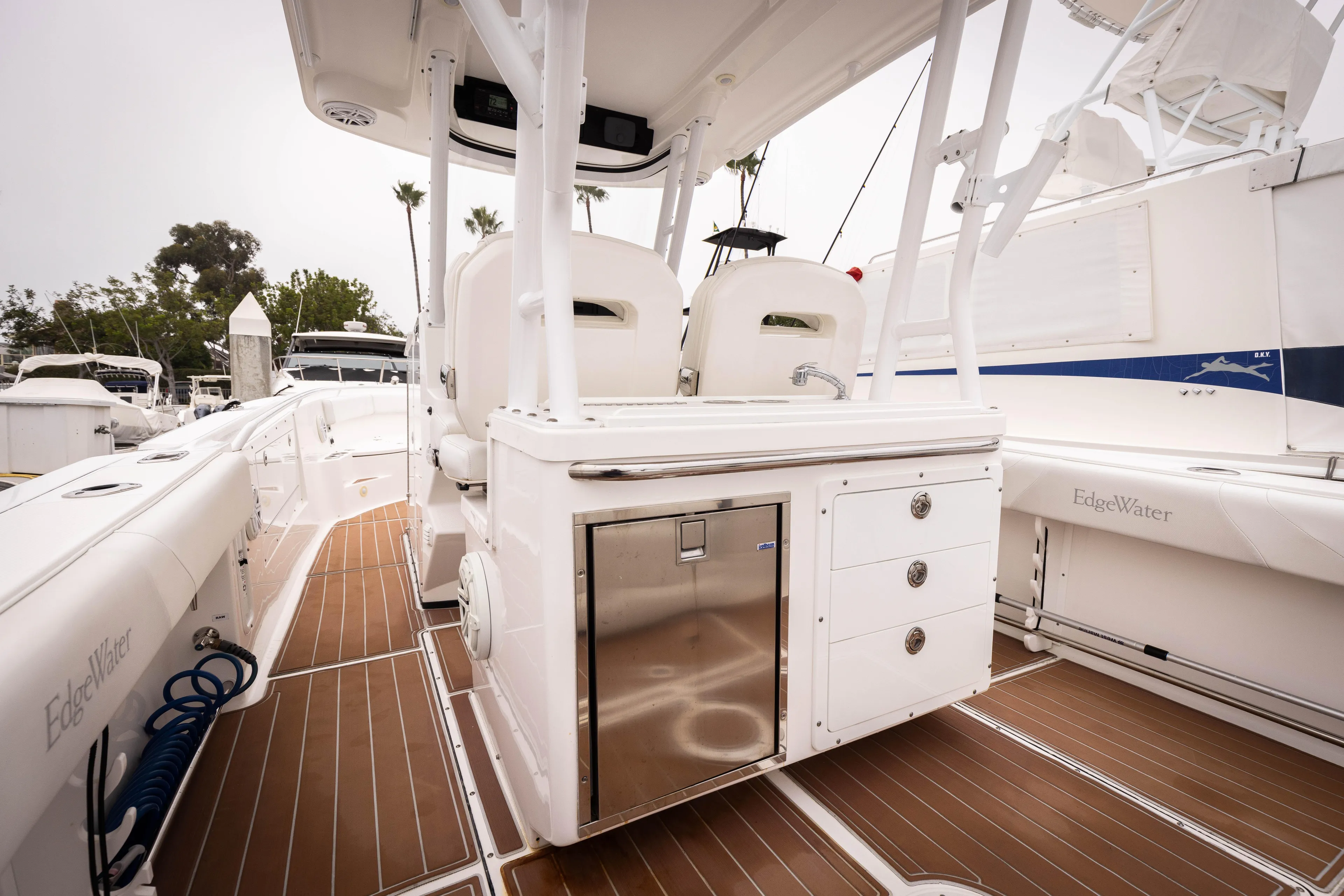 Pure Vida Yacht Photos Pics 2017 Edgewater Center Console boat interior with sleek design and modern amenities.