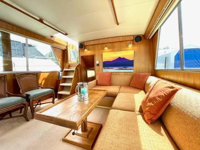 Venture 1 Yacht Photos Pics Interior of a 1985 Tollycraft 43 yacht with cozy seating area.