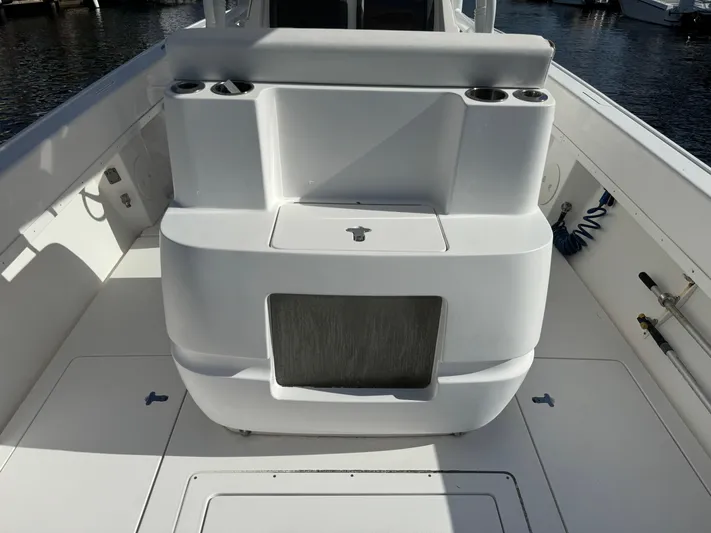 No Name Yacht Photos Pics 2014 Intrepid 327 Center Console boat interior with seating and storage compartments.