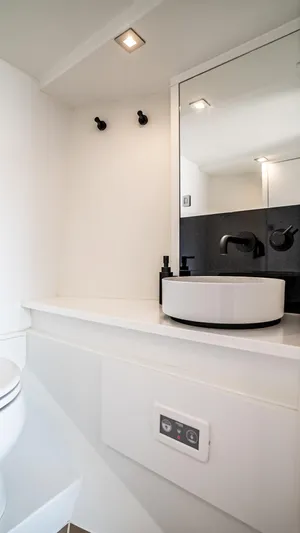  Yacht Photos Pics Modern bathroom interior in 2023 VanDutch 32 yacht, featuring sleek design and fixtures.