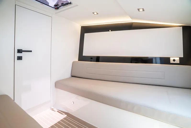  Yacht Photos Pics Interior of 2023 VanDutch 32 yacht, featuring sleek modern design and comfortable seating.