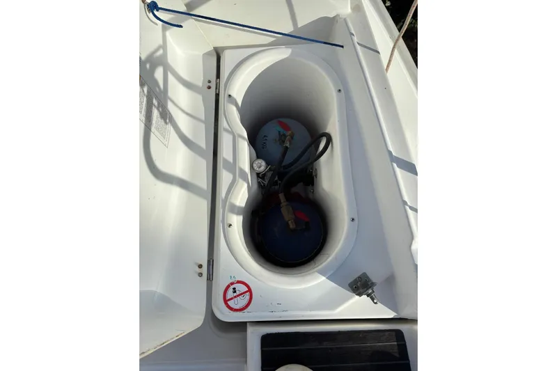  Yacht Photos Pics Storage compartment on 2009 Jeanneau Sun Odyssey 39i sailboat with gas cylinders.