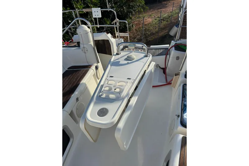  Yacht Photos Pics Cockpit of 2009 Jeanneau Sun Odyssey 39i sailboat with seating and control panel.