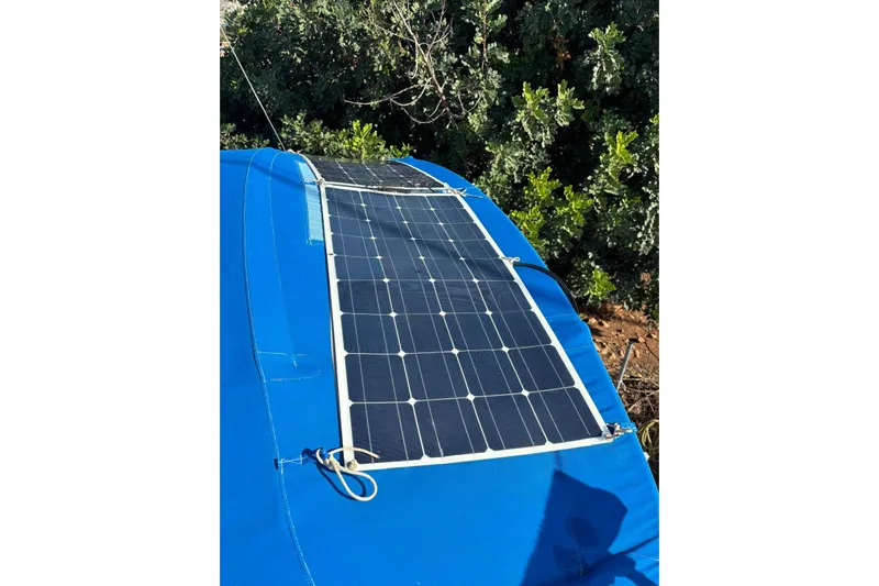  Yacht Photos Pics Solar panel on Jeanneau Sun Odyssey 39i sailboat, 2009 model, with blue cover.