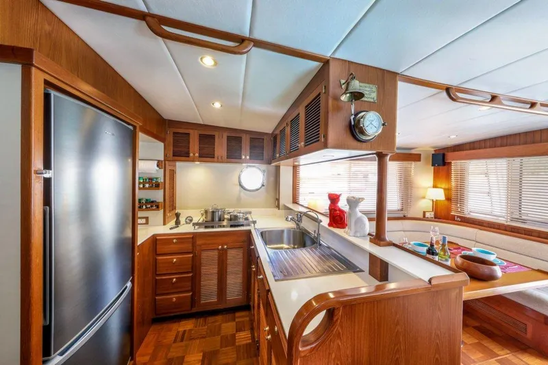 My Lindavia Yacht Photos Pics Luxurious 2012 Kadey-Krogen 44 yacht interior with modern kitchen and dining area.