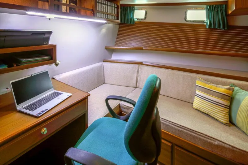 My Lindavia Yacht Photos Pics Cozy office space in 2012 Kadey-Krogen 44 yacht with desk, laptop, and seating.