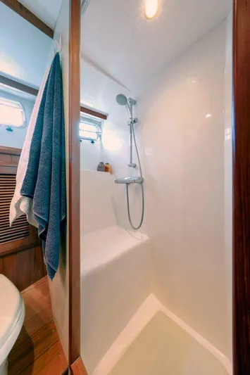 My Lindavia Yacht Photos Pics Shower area in 2012 Kadey-Krogen 44 yacht, featuring modern fixtures and wooden accents.