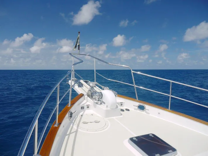 My Lindavia Yacht Photos Pics Bow view of 2012 Kadey-Krogen 44 yacht cruising on open ocean under clear skies.