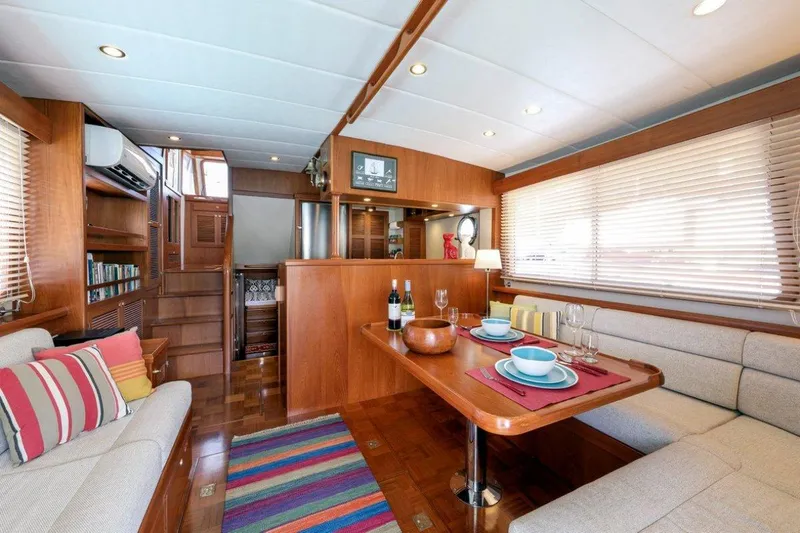 My Lindavia Yacht Photos Pics Luxurious interior of 2012 Kadey-Krogen 44 yacht with dining area and cozy seating.