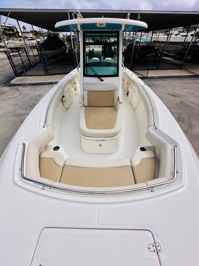 Priced To Sell! Yacht Photos Pics 2020 Boston Whaler 280 Outrage boat with spacious seating and sleek design.