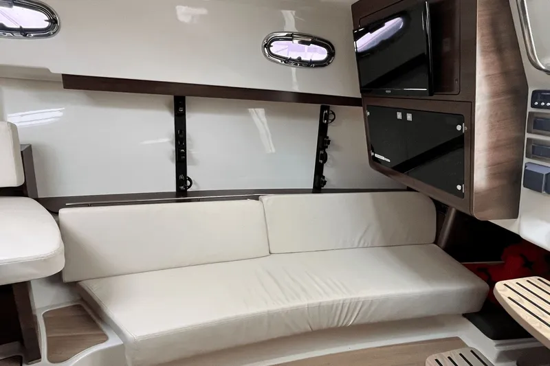  Yacht Photos Pics Interior of 2022 Boston Whaler 345 Conquest, featuring a comfortable seating area and modern amenities.