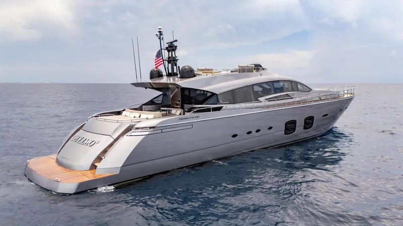  Yacht Photos Pics Luxury 2021 Pershing 108 yacht cruising on open sea under cloudy sky.