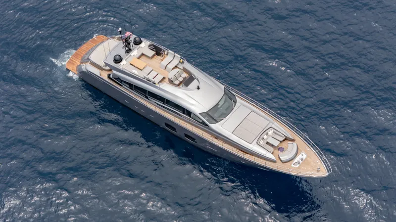  Yacht Photos Pics Aerial view of 2021 Pershing 108 yacht cruising on open sea.